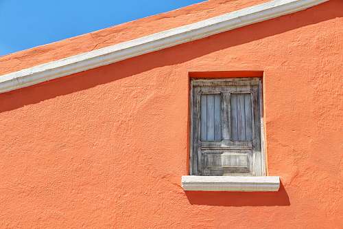 window selective focus of close window at daytime brick