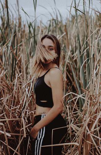 woman woman at grass flipping her hair female