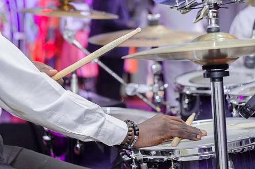 musician man playing drum set musical instrument