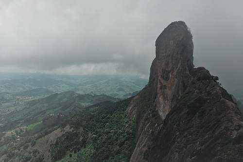 outdoors aerial photography of mountain during daytime cliff