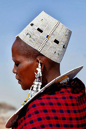 human selective focus photography of woman wearing traditional dress person