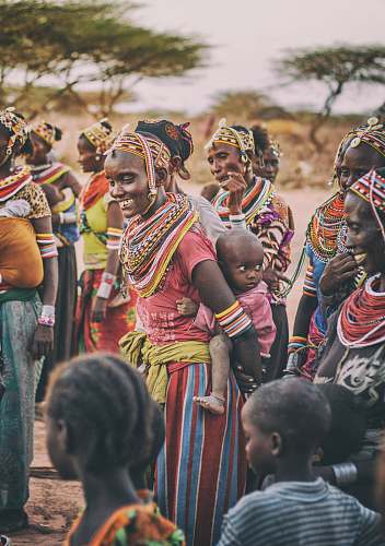 people group of people standing on brown ground tribe
