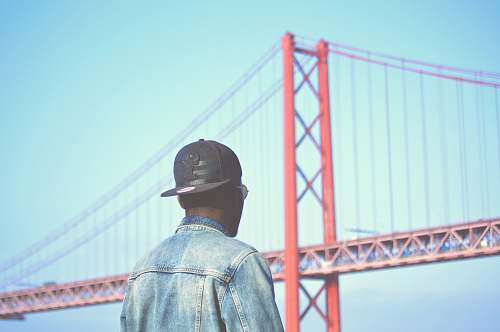 human man looking at the Golden Gate Bridge in San Francisco people