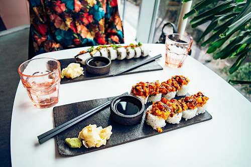 sushi sushi rolls with sauce meal