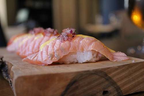 sushi sushi set on a brown wooden tray seafood
