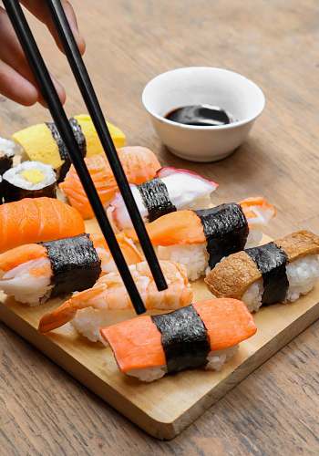 food sushi on wooden tray burger