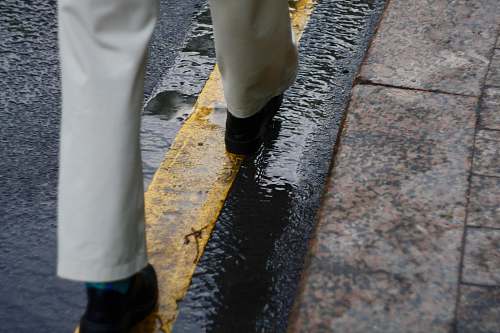 clothing person walking on road footwear