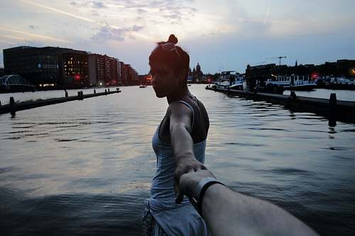 human woman holding person hand taking selfie people