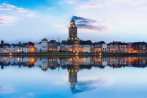 architecture lighted buildings across placid lake building