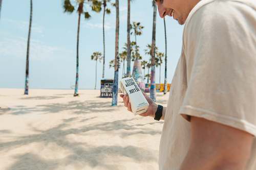 brochure man in white t-shirt holding white plastic bottle flyer