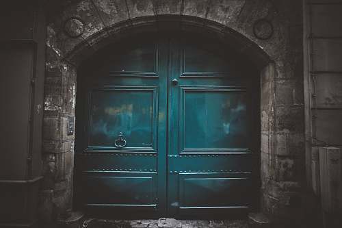 grey blue wooden double arch door s architecture