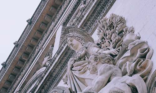 sculpture high angle photography of white statute statue