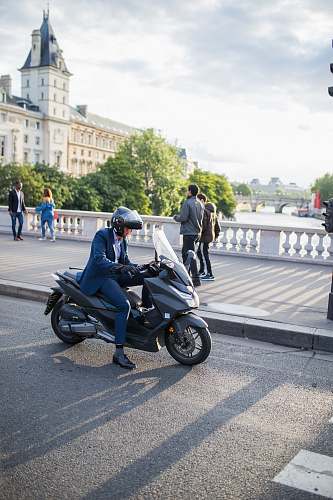 transportation man riding motor scooter scooter