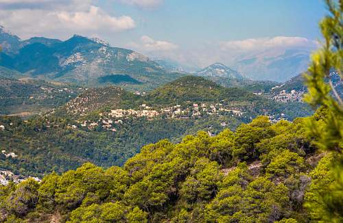 mountain aerial photography of trees mountain range