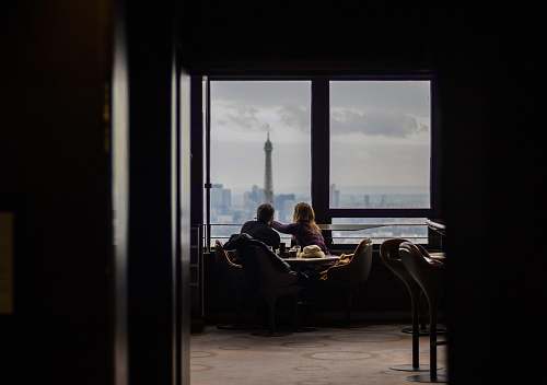 people couple sitting while eating human