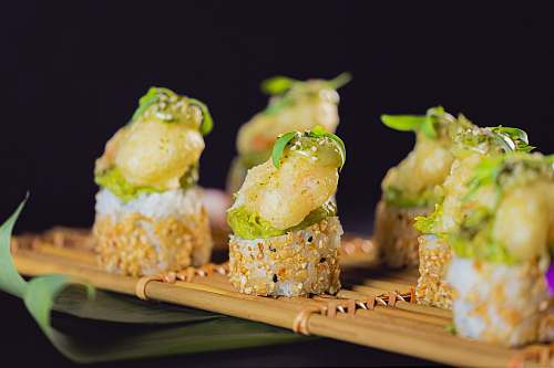 confectionery sushi roll on bamboo tray sweets