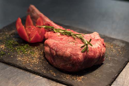 seafood medium-rare steak with rosemary on top sea life