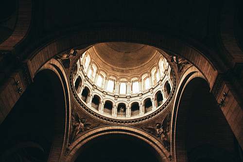building architectural photography of brown monument interior view paris