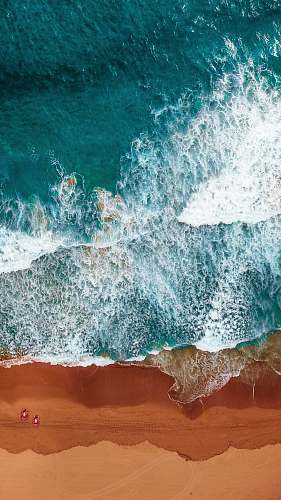 sea aerial photography of beach water