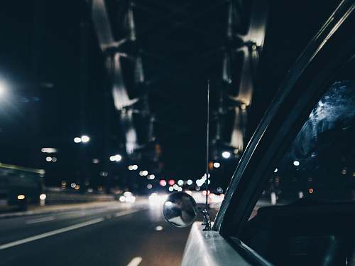 road photo of vehicle side mirror sydney harbour bridge