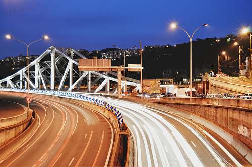 road time-lapse photography of vehicles on roadway light