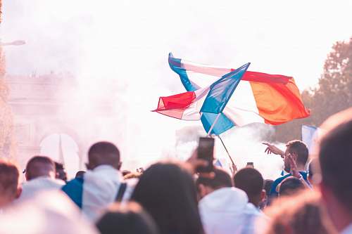 person person holding flag crowd