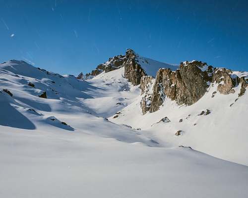 outdoors snow covered mountain mountain