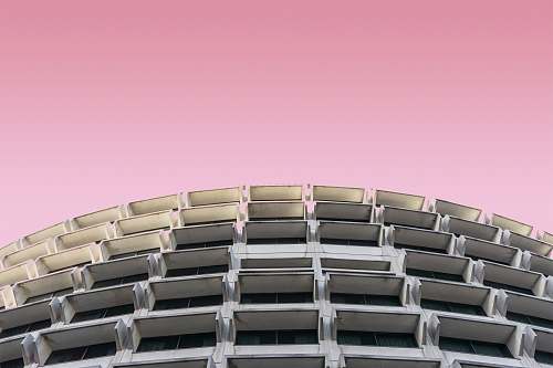 france gray high rise building pink