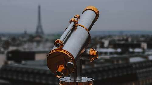 france selective focus photography of gold and gray telescope telescope