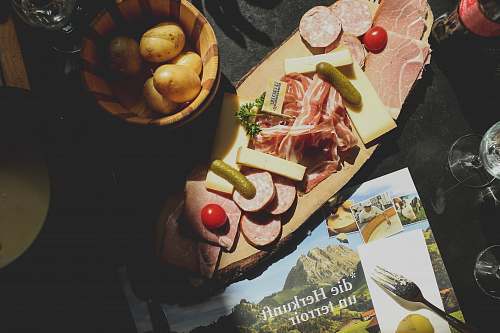 person bacon on brown wooden platter human