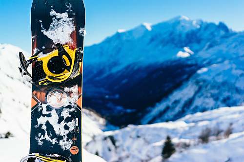 snowboarding shallow focus photography of snowboard sport
