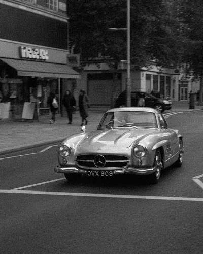 black-and-white silver Mercedes-Benz car on road vehicle