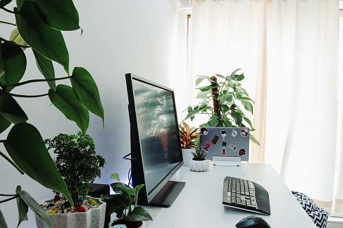 table black computer monitor on desk desk