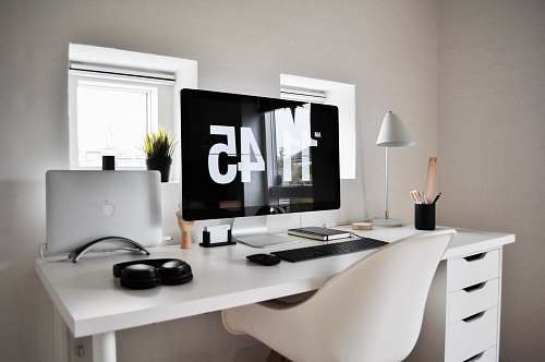 desk flat screen computer monitor inside room table