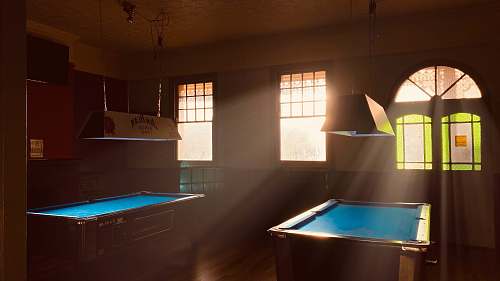 indoors white and brown pool table room