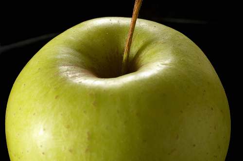 apple close view of green apple on black background fruit
