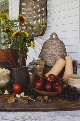 apple red apple fruit beside brown woven basket food