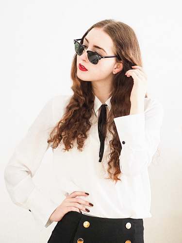 accessory woman in white long sleeve shirt wearing black sunglasses sunglasses