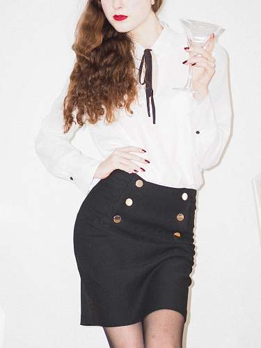 clothing woman in white long sleeve shirt and black skirt female