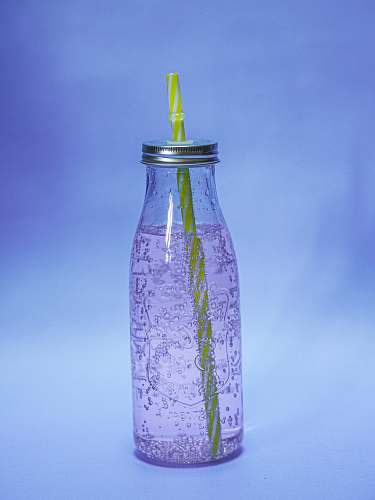 glass white and green floral glass bottle california