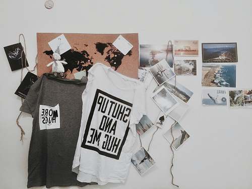 poster two white and gray text-printed hanging shirts t-shirt design