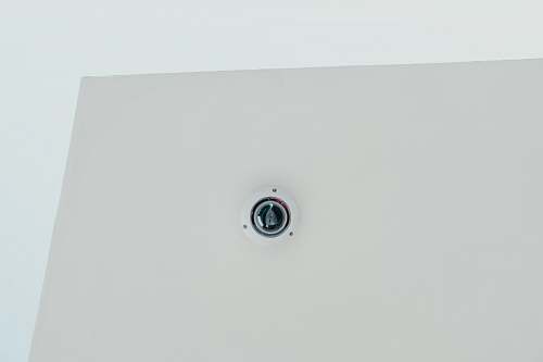 belgium white and black dome security camera grey