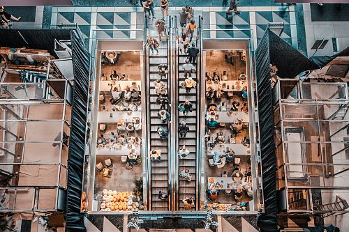 birds eye photography of people walking in stair