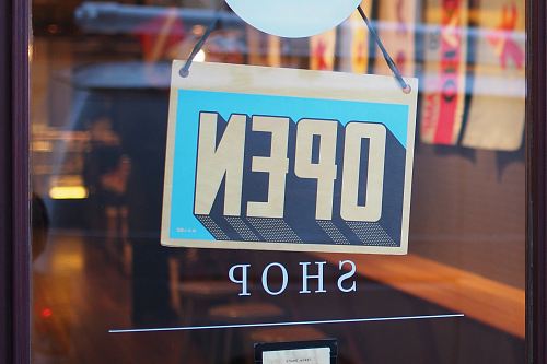 gray and blue Open signage