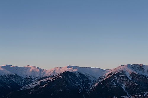 high-angle photo of snow-covered mountains