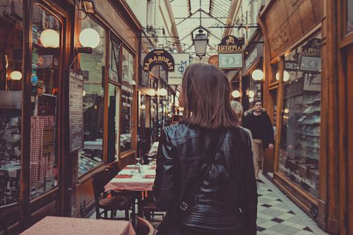 woman walking in hallway