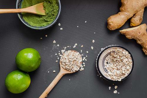 fruit green apple beside brown wooden spoon apple