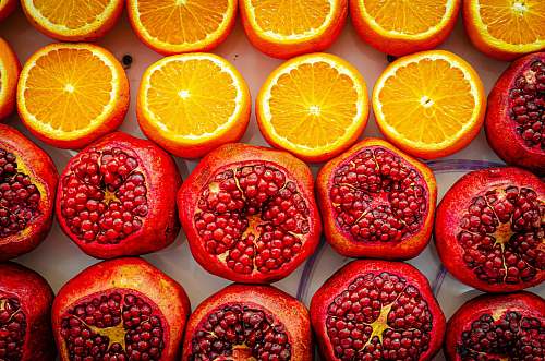 fruit shallow focus photo of sliced orange fruits plant