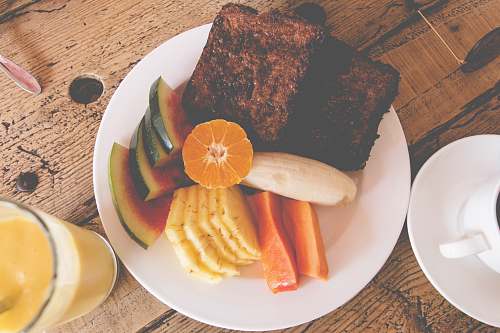 meal sliced fruits on plate dish