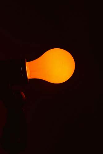 light lighted orange CFL bylb lightbulb